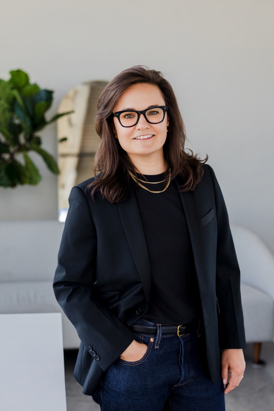 Jessica Ferrell smiling in a black blazer